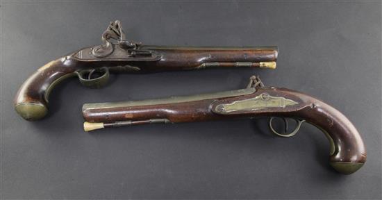 A pair of early 19th century flintlock holster pistols, signed Weston, Lewes, 15in.